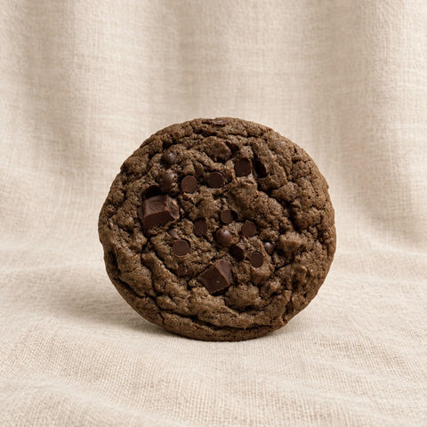 double chocolate chip cookie on fabric background