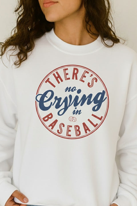 White sweatshirt with 'There's no crying in baseball' text design.